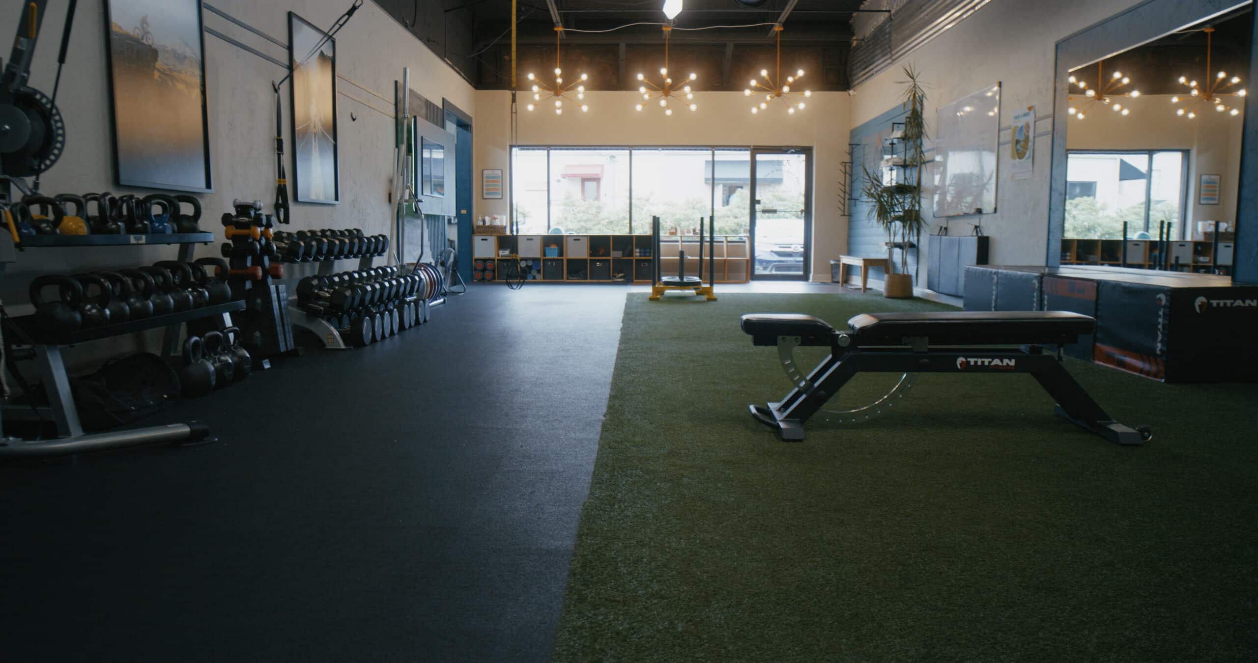 weight bench and wall of weights