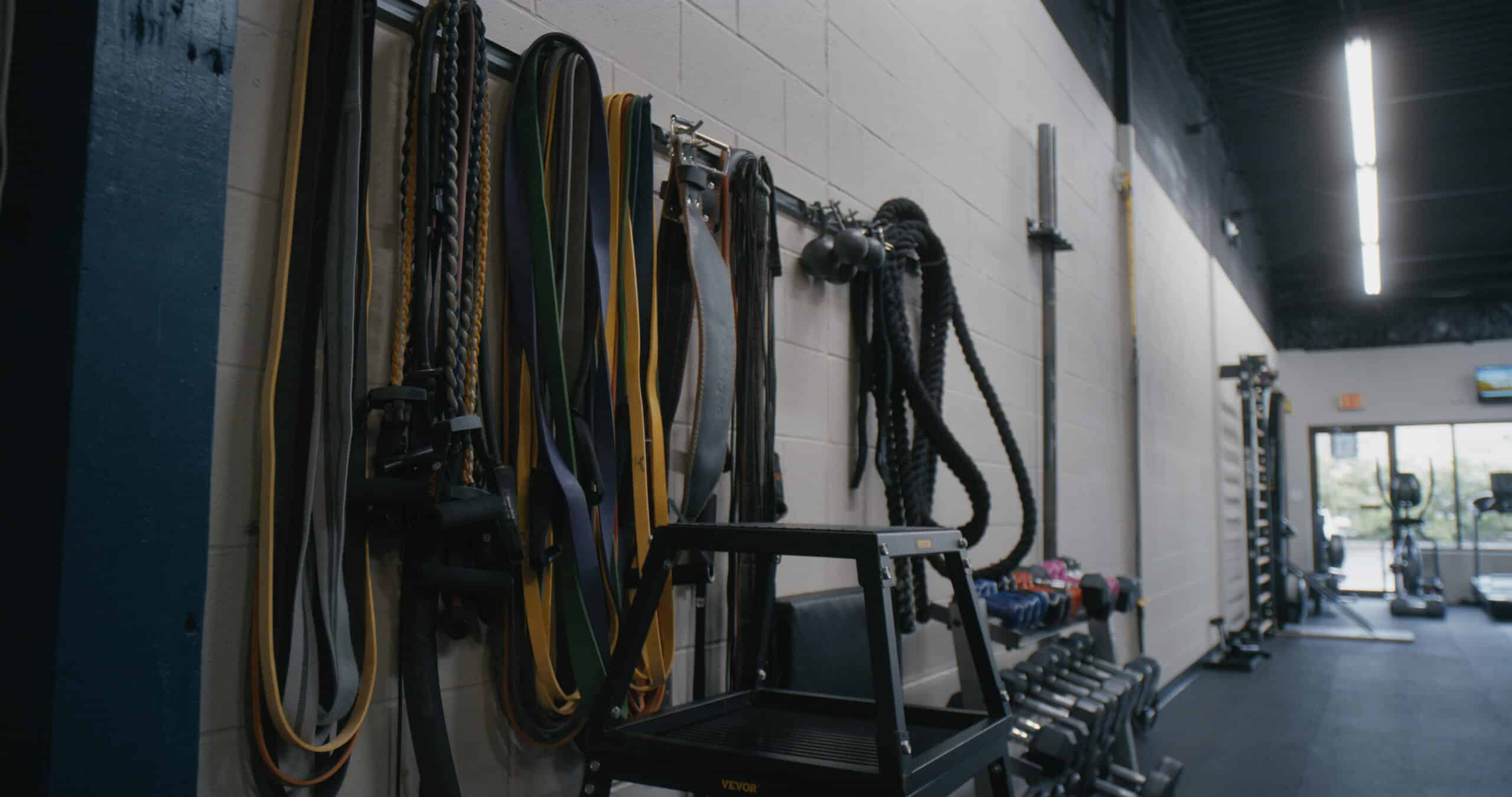 bands on a rack at the gym